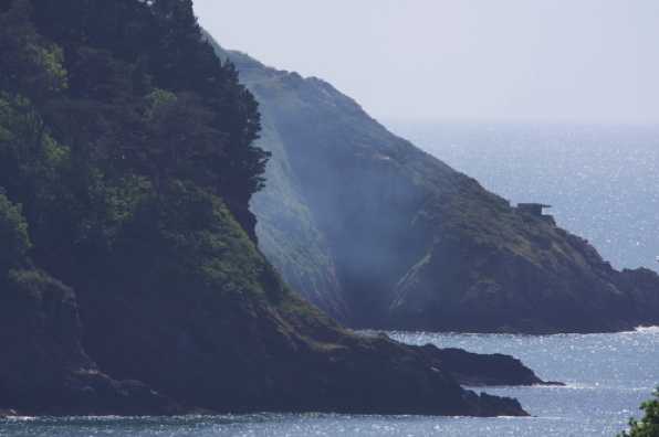 24 May 2020 - 10-59-51 
The Kingswear fire continues to smoulder even on the river side of the hill. 
---------------------------
Kingswear headland fire